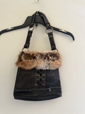 Black Shoulder Bag with Brown Fur Trim and Lace-Up Detail